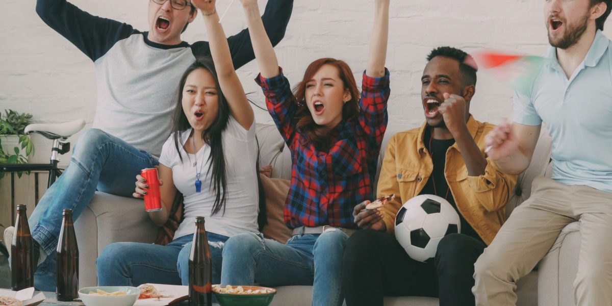 The Broadcast Approach That Drives FSU Football Fan Engagement 3 A diverse group of FSU football fans of various ages and backgrounds, united by their passion for the team.