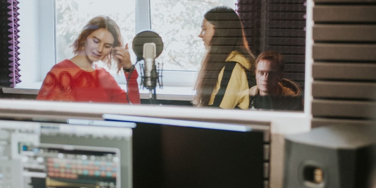 Choosing Live TV Channels and Streaming Platforms for Global Sports Broadcasting 11 A team diligently monitoring a live sports broadcast to ensure quality and reliability.