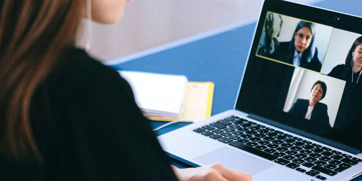Professionals collaborating remotely, symbolizing global distribution and adapted content for diverse audiences.
